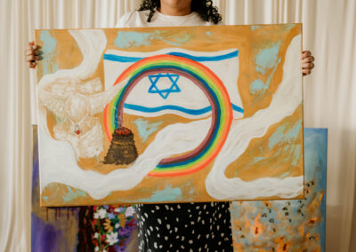 Woman holding a painting