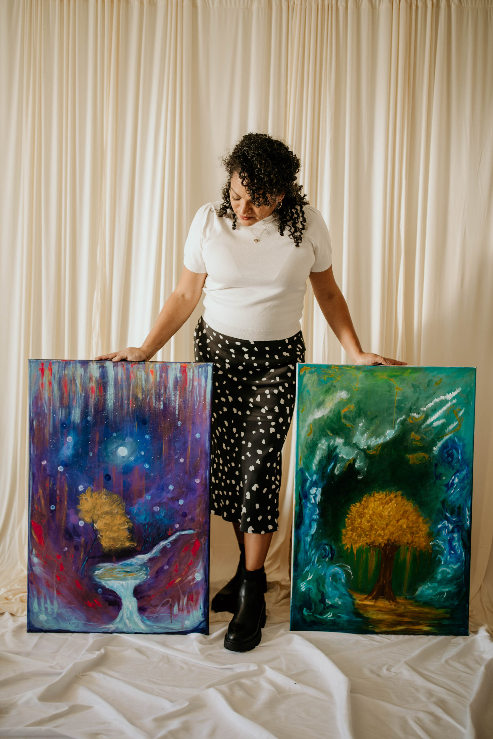 Woman holding a painting
